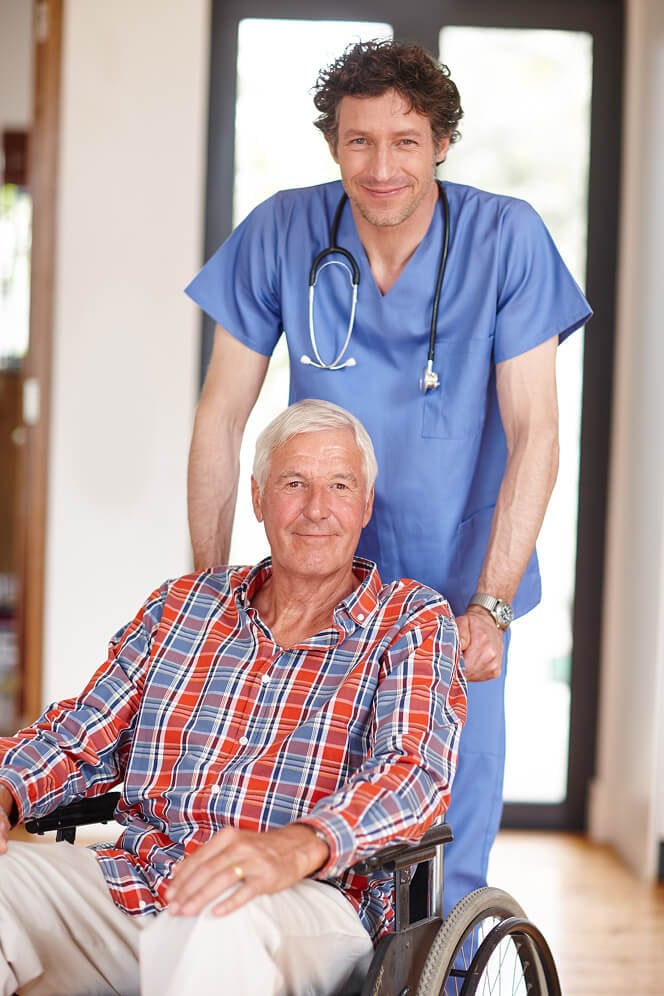 Nurse Comforting Elderly Woman at Nursing Home Colleyville